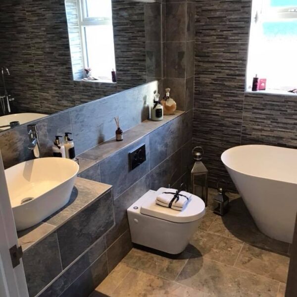 Slate Effect Grey Tiled Bathroom With Stripe Feature